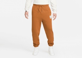 NIKE AIR JORDAN ESSENTIALS STATEMENT FLEECE PANTS DESERT BRONZE